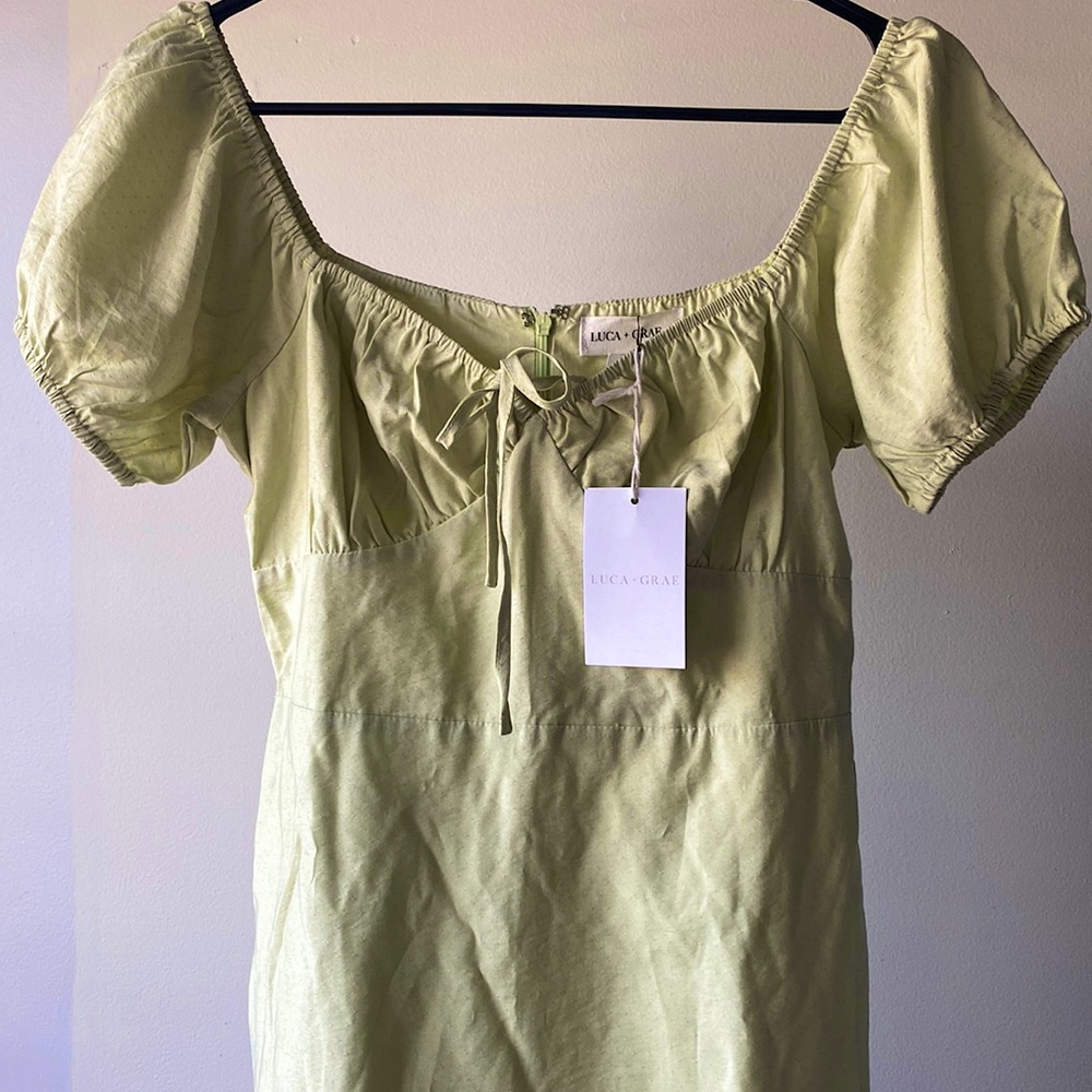 The perfect little green dress! New with tags. Brand: Luca + Grae